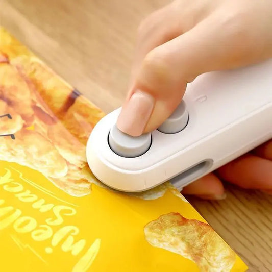 Remifa® Mini snack bag sealing machine,2 in 1 heat USB rechargeable snack bag selaer,plastic Electric bag sealers, keep food fresh. Portable Sealer Picnics